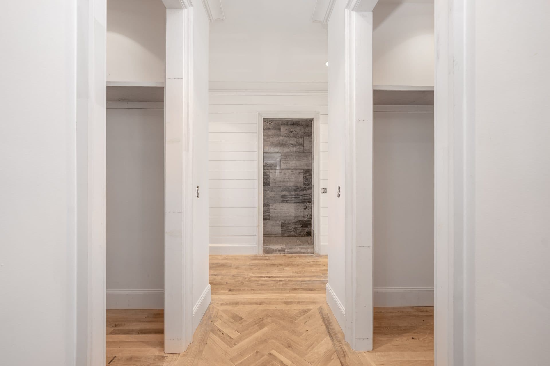 Herringbone hardwood and shiplap